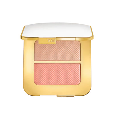 Compact blush with two shades in a gold case on a white background