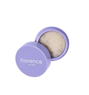 Cosmetic container with cream inside, branded 'florence by Mills', on a white background